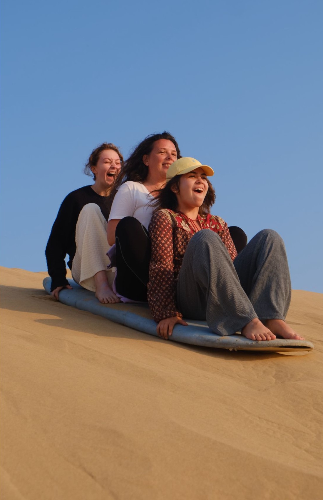 Sand surfing in the dunes